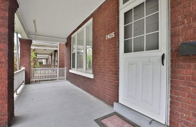 Charming 5-Bedroom Home with Exposed Brick and Modern Upgrades Gallery 4