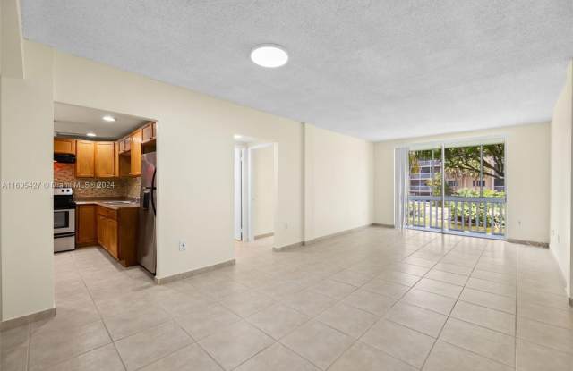 6707 NW 169th St - 6707 Northwest 169th Street, Country Club, FL 33015