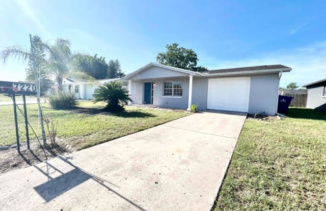 7220 Castanea Drive - 7220 Castanea Drive, Jasmine Estates, FL 34668