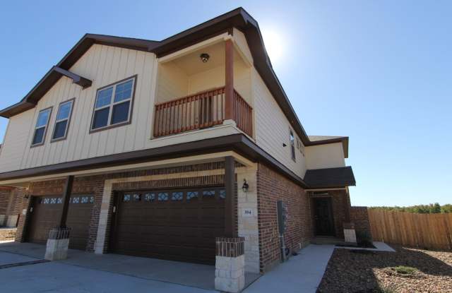 3 Bedrooms w Game Room / Balcony / Covered Back Patio / Fenced in Backyard / Near Creekside Shopping  Restaurants / CISD - 394 Creekside Curve, New Braunfels, TX 78130