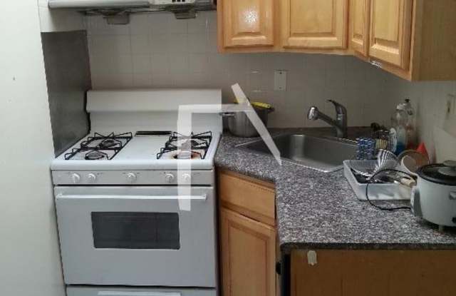 $1,000 Rebate! Huge Brownstown Apt w Backyard  Porch at the Best Possible Price! Two Full Bathrooms. Plenty of Natural Light! photos photos