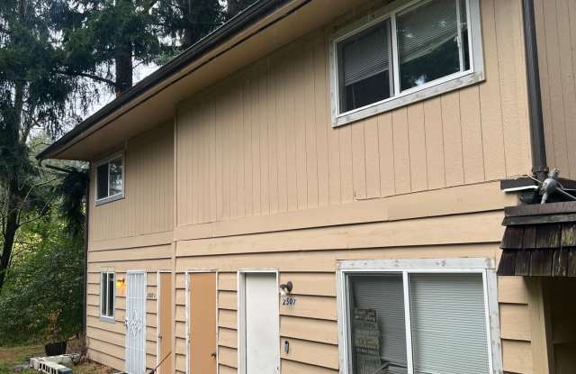 Spacious 2-Bedroom Steilacoom Duplex | Yard, Covered Parking & Washer/Dryer | $1,895 photos photos