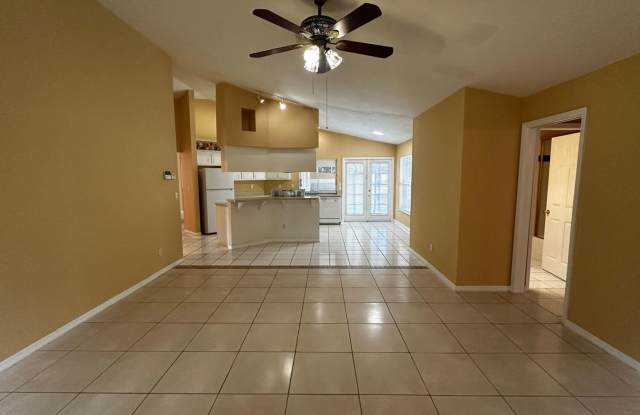 SPACIOUS 4-BEDROOM HOME WITH SCREENED POOL IN SE CAPE CORAL photos photos