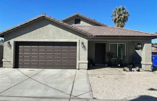 Comfortable 4BR/2BA Home with Yard  Parking – Available Now! photos photos