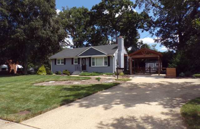 Charming Ranch-Style Home with Finished Basement and Outdoor Oasis in Alexandria photos photos
