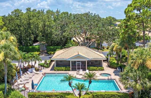 ** VILLAGES OF EMERALD BAY ** FIRST FLOOR 2 BEDROOM PLUS A DEN\2 BATH CONDO WITH LAKE VIEW ** NORTH NAPLES ** SEASONAL ** photos photos