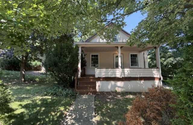 Three Levels of Living with 4 Bedrooms, 2 Full Bathrooms and Multiple Living Areas! photos photos