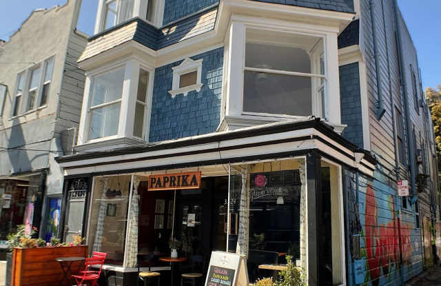 LOWERED PRICE! FULL FLOOR FLAT! Bay Windows, IN-UNIT LAUNDRY, Remodeled! Bonus Room! photos photos