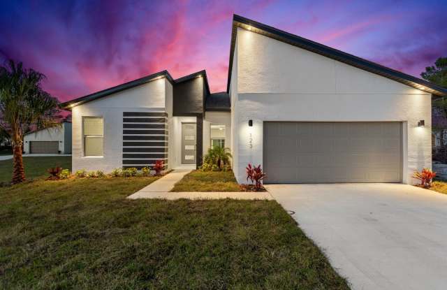 Deposit-Free! Modern, energy efficient home with ALL of the upgrades! - 123 Tulip Lane, Poinciana, FL 34759 Deposit-Free! Modern, energy efficient home with ALL of the upgrades! - 123 Tulip Lane, Poinciana, FL 34759