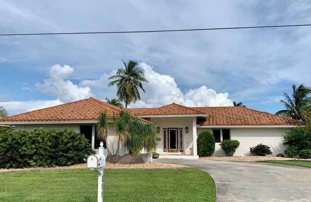 AVAILABLE 2027 SEASON! ! PGI HEATED POOL, WATERFRONT, BOAT LIFT Gallery 1