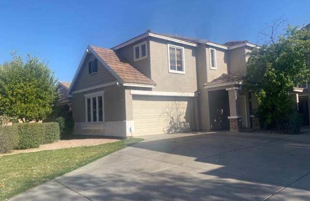 Two-story 4-bedroom plus den home in gated Barrington Estates, Mesa. photos photos