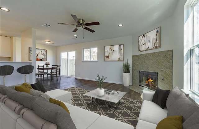 Modern Comfort Meets Relaxed Living in This Bright, Stylish Home with a Private Backyard Oasis photos photos