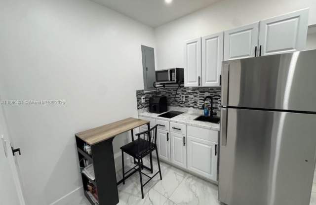 1309 NW 55th Ter photos photos