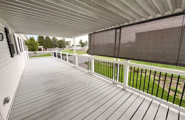 Single Family Bi-Level Home with Large Deck and Fenced Yard Gallery 3