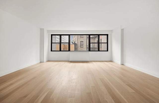 115 E 9th St photos photos