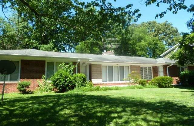 Walk to Campus! Incredible location, amazing space in this sprawling 4br home in downtown Chapel Hill photos photos