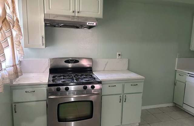 Spacious 3-Bedroom, 2-Bath Home in North Pomona – Beautiful Wood Flooring, Fireplace & More! Gallery 1