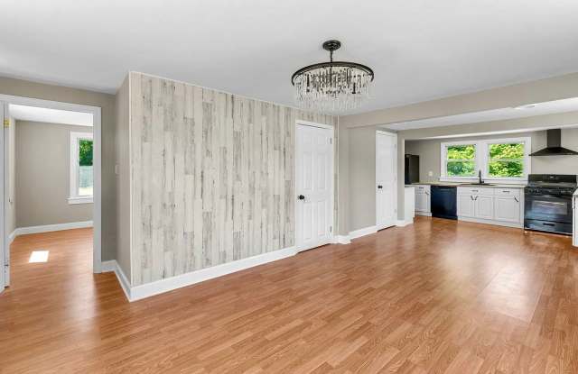 Renovated 3BR Coastal Retreat | Water Views & Private Beach Access | $1,650 Gallery 1
