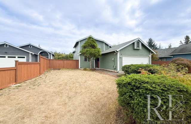 Spacious 4-Bedroom Home with Fenced Yard  Fireplace - 7640 Colony Court Northeast, Kitsap County, WA 98311