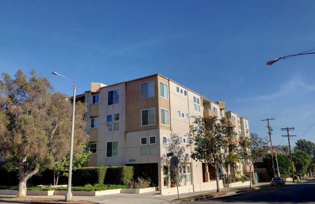 Top-Floor large condo on tree-lined street photos photos