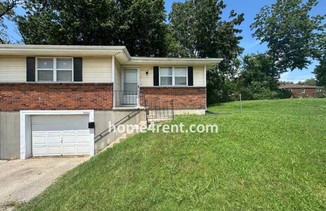 Raised Ranch Style Home in KCK w/ a Finished Basement and Conveniently Located Near I-635! photos photos