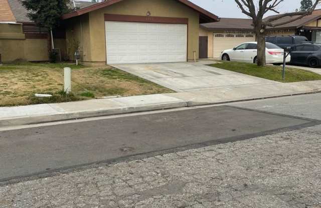 Spacious 3 Bedroom Home with Fireplace, Covered Patio and Community Pool in SW Bakersfield photos photos