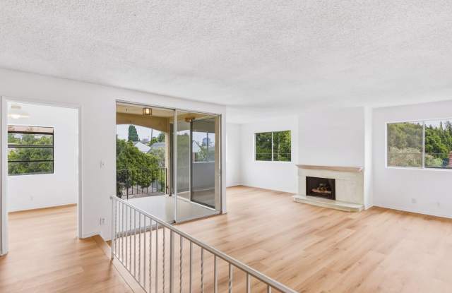 HUGE TOP FLOOR 2 BED 2 BATH IN PRIME SANTA MONICA! -FIREPLACE, BALCONY & GARAGE PARKING SPACE photos photos