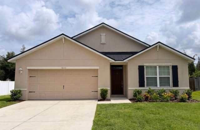 Single Family Home In SW Cape Coral - 4 Bedroom 2 Bath 2 Car Garage! photos photos