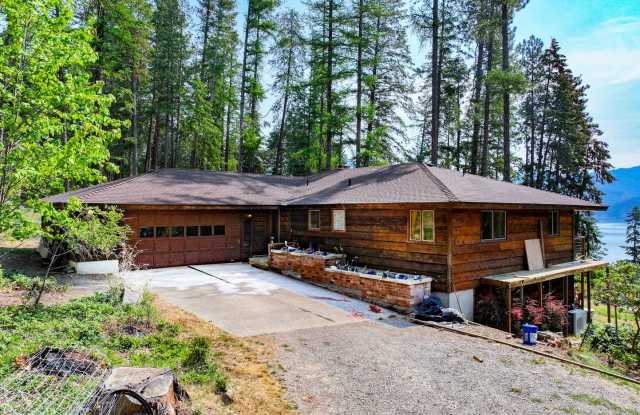 2700 + sq ft family home has it all! Over 2 acres of land and a stunning view of Lake Pend Oreille photos photos