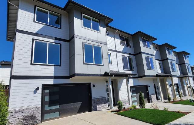 Brand New Spacious and Light-Filled Condo Offering an Open Layout, Island Kitchen, and Outdoor Deck photos photos