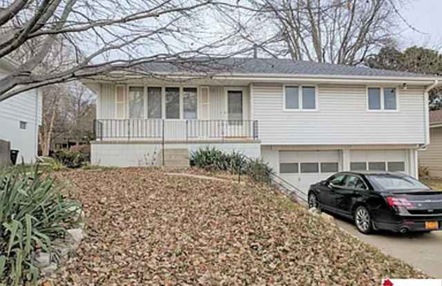 9312 Spaulding St - 3 Bed/2 Bath Raised Ranch in Keystone | Updated Kitchen, Finished Lower Level, 2-Car Garage photos photos