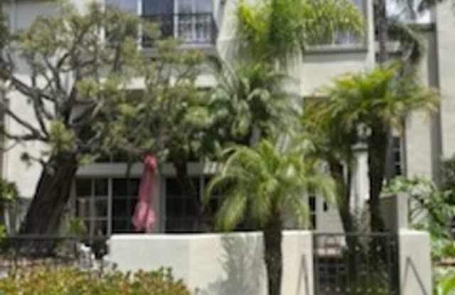 Luxurious Townhouse Located in the exclusive guard-gated community of "Seacliff on the Greens" photos photos