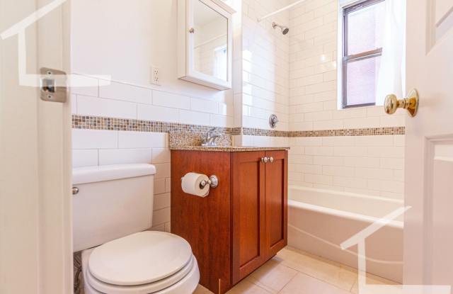 Newly renovated 2nd floor 1 bed unit right next to the Green Line! Gallery 4