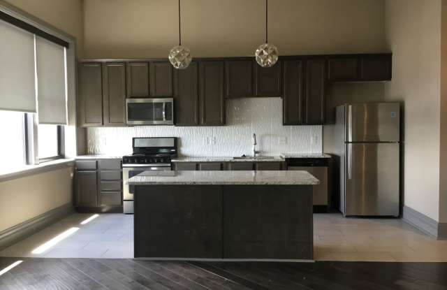 Come live in the Parker Building in Downtown Davenport. photos photos