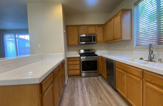 NOW AVAILABLE FOR IMMEDIATE MOVE IN.. FRESH  CLEAN 4 BED, 3 BATHS, 2 CAR GARAGE IN NATOMAS PARK photos photos