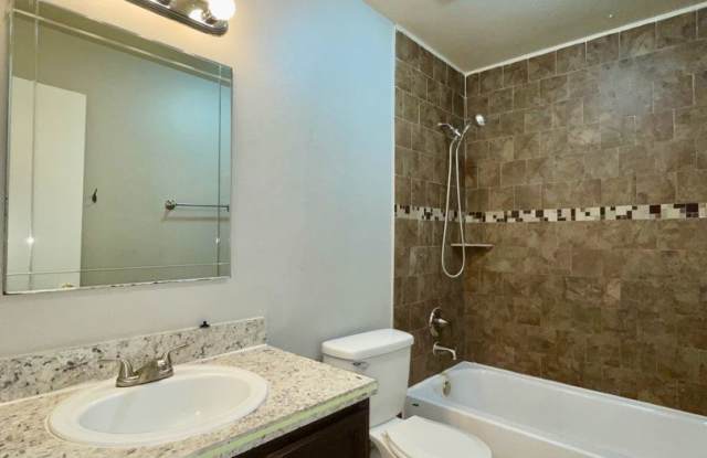 Spacious 2-story 2 BR/1.5BA Avalon Condo Near Airport Gallery 1