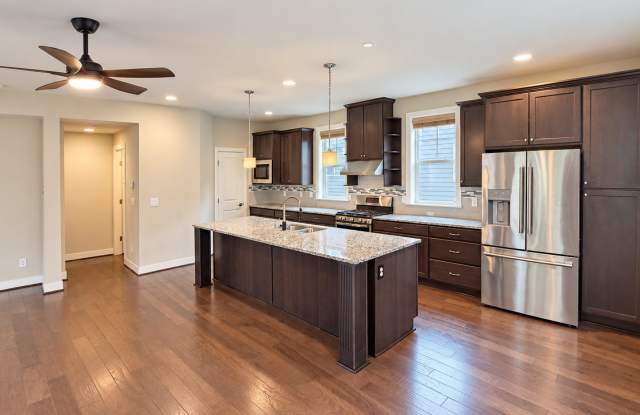 Spacious Multi-Level Townhome with Attached Garage, Open-Concept Living & In-Home Laundry Gallery 4
