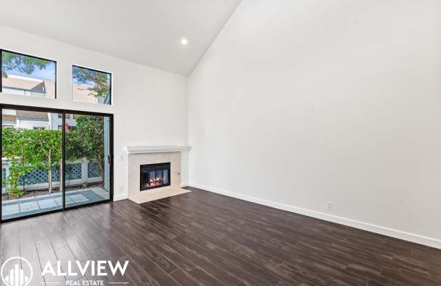 Beautifully Upgraded 2 Bed, 2 Bath + Den Woodbridge Townhome Available Now! photos photos