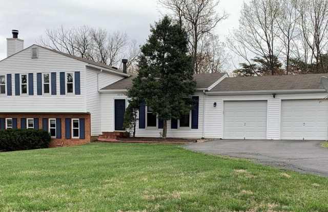 Lovely 4 bedroom, split level home with updated kitchen appliances and floors. photos photos