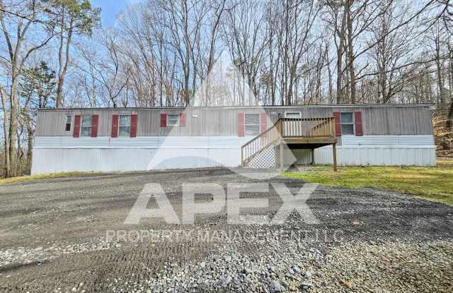 3 Bd | 2 Ba. Single Family Mobile Home in private country setting in North Knoxville! Gallery 4