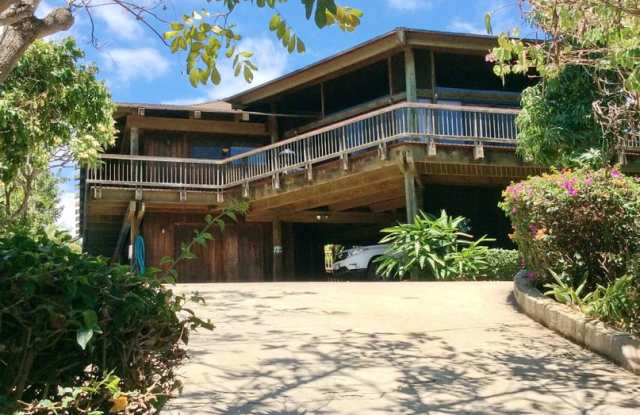 Very private, mostly furnished, rustic Maui Meadows home with large pool, walk around deck with panoramic ocean views. Available for 6 months only. Gallery 4