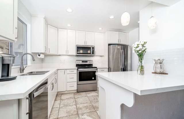 Recently upgraded townhome in gated community with marina access Gallery 1