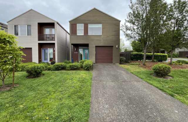 Charming 3 Bedroom, 2.5 Bathroom Home with Large Living Room, Tall Windows, Island Kitchen, and Attached Garage photos photos