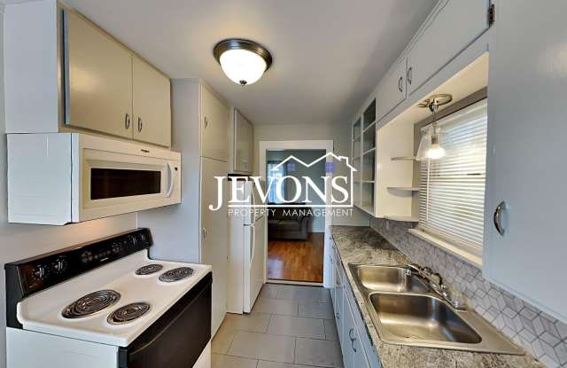 A 2-bedroom home with a 2-car garage plus driveway parking, and an in-unit washer and dryer Gallery 3