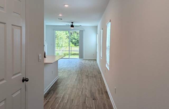 NOW LEASING - NEW 2026 VILLA CONSTRUCTION!! 3/2.5/1 with premium finishes in the a new development community of in Hansen Creek - conveniently located just off I-295 and Lem Turner. Gallery 4