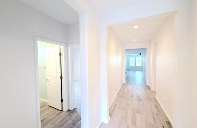 Beautiful new 4-bed, 2-bath home in the Broadmoor Heights area of Rio Rancho! Refrigerated Air! Gallery 4