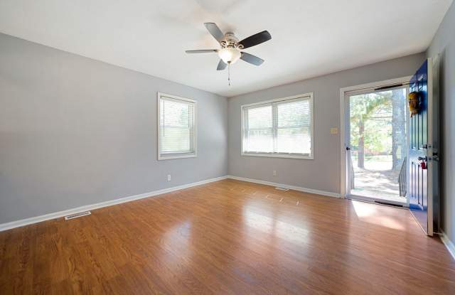 Charming 3-bed/2 bath home with large yard, screened deck located minutes from Brier Creek! photos photos