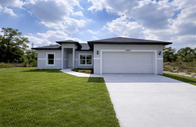 MODERN BRAND NEW 4BD/2BA RETREAT IN LEHIGH ACRES! photos photos
