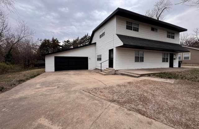 Cozy with lots of character, flexible floor plan could be 4-or 5-bedroom, oversized garage and large outdoor space! photos photos