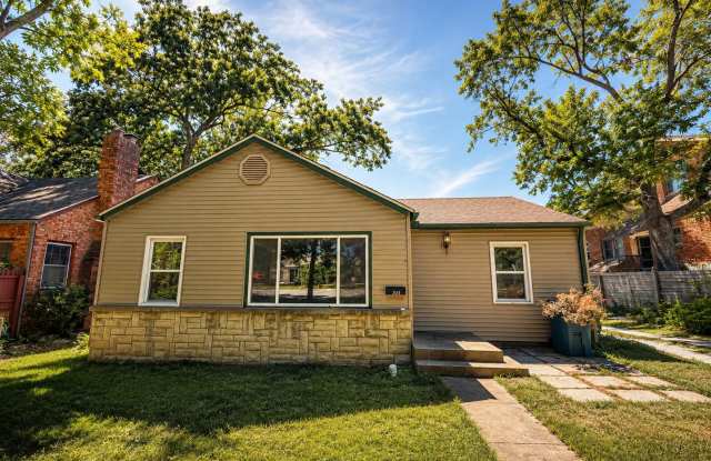 Spacious 4 Bedroom, 1 Bathroom Home with Bonus Living Area & Fireplace! photos photos